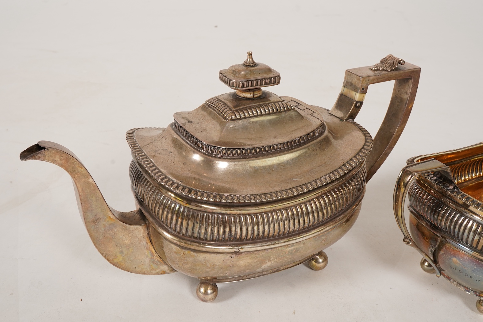 A George III silver three piece tea set, by John Wakefield